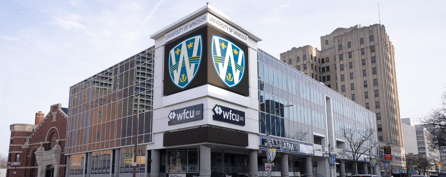 Rendering of 300 Ouellette with UWindsor logo on screens 