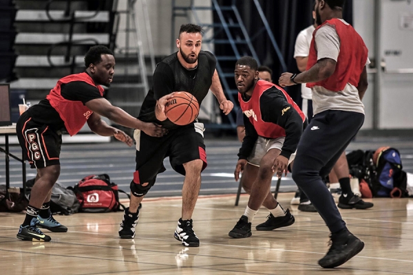 men playing recreational basketball