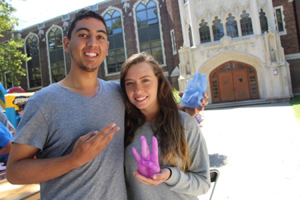 Ali Kareem and Katherine Lambruzzo show off wax casts of their hands