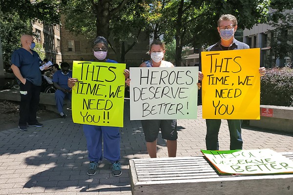 staff members outside Sick Kids hospital