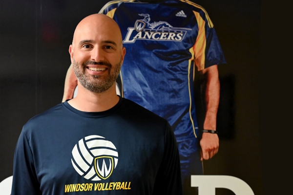 Jimmy El-Turk wearing Lancer volleyball T-shirt