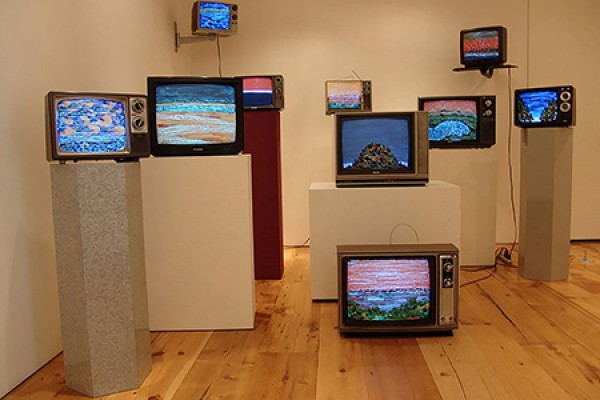 television sets arranged artistically by Iain Baxter&amp;