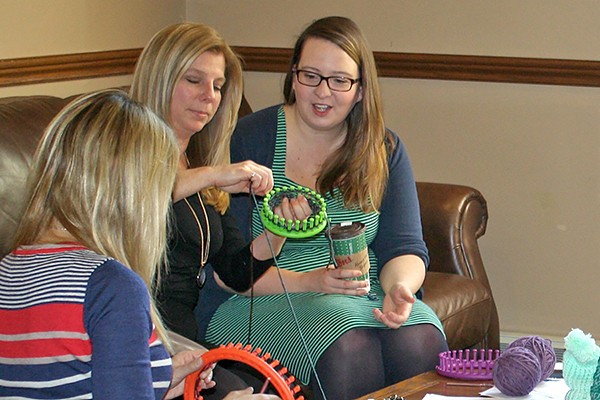 Loom knitters learn how it’s done in Assumption Hall.