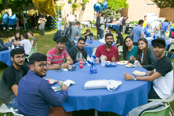 Students attending OPUS barbecue