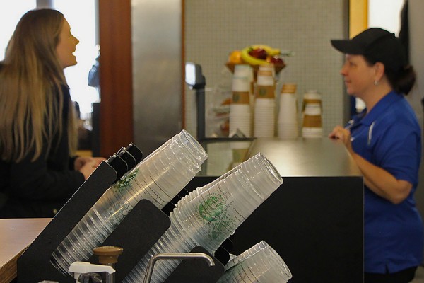 Starbucks staff serve campus customers
