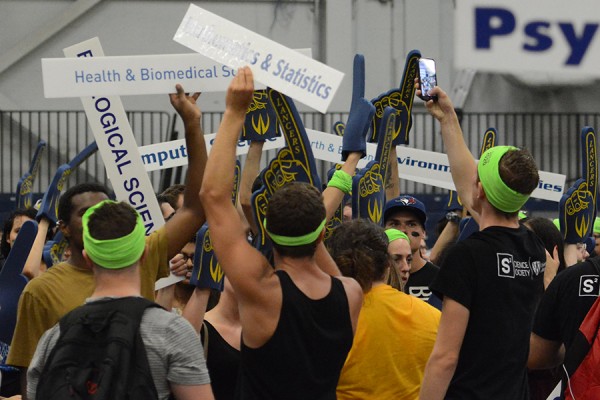 students holding program signs at Welcoming Celebration