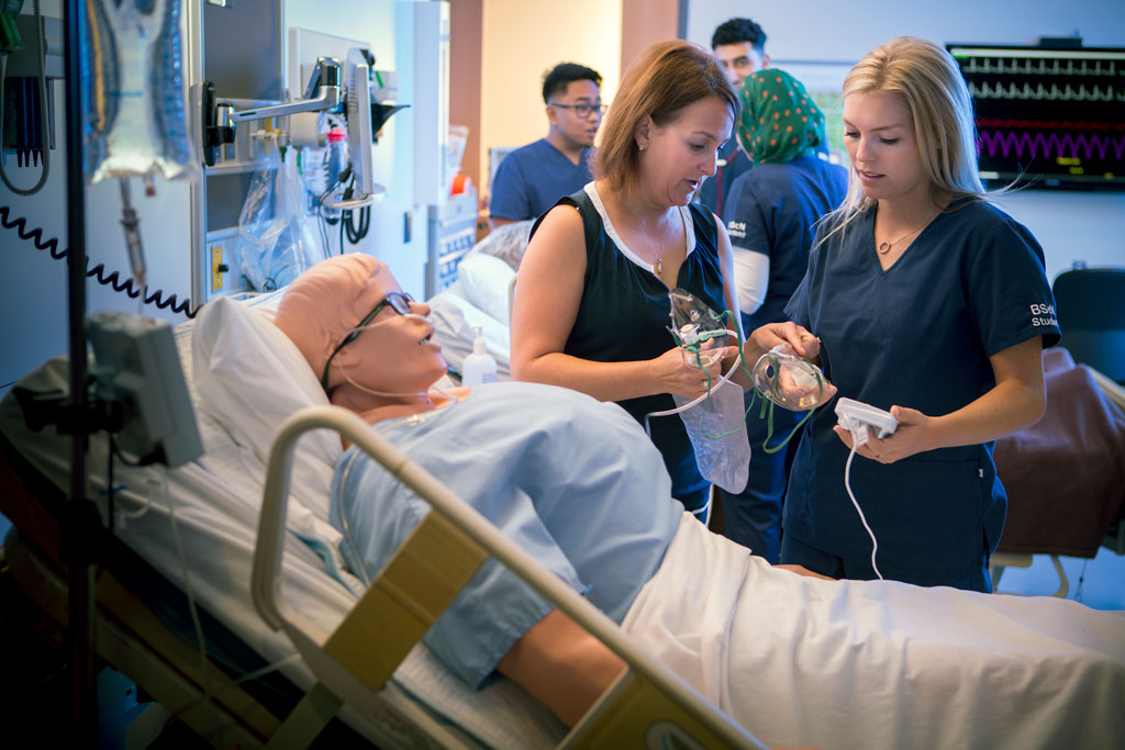 Nursing professor Judy Bornais teaches in the simulation suites in the medical education building.
