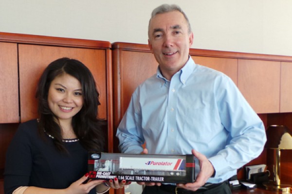 Jing Wen Luo with Purolator Canada president Patrick Nangle