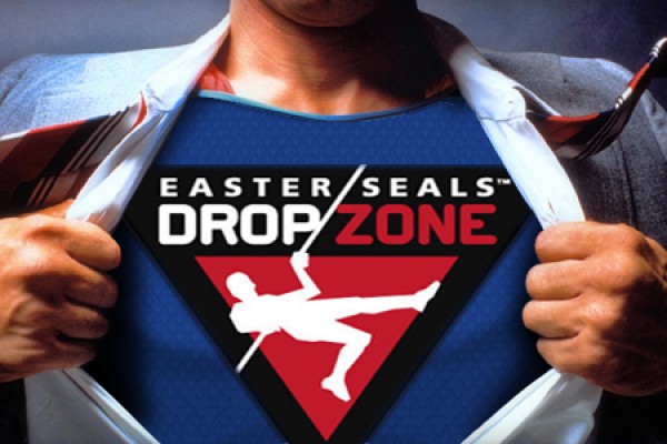 Shirt pulled open to reveal Drop Zone logo