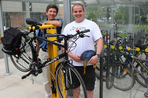 Paul Henshaw and Josh Psavka in front of Fixit station