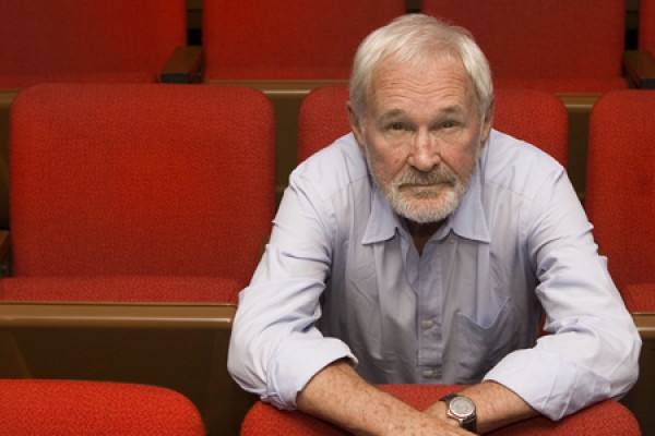 Norman Jewison sits in movie theatre.