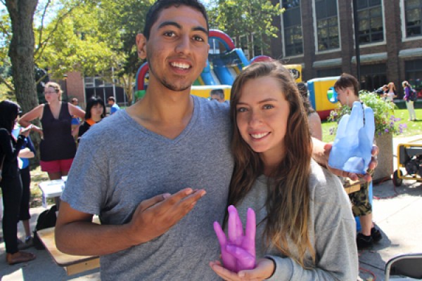 Ali Kareem and Katherine Lambruzzo show off wax casts of their hands