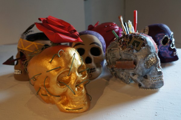 these skull sculptures are inspired by the Mexican Dia de los Muertos skull sculptures