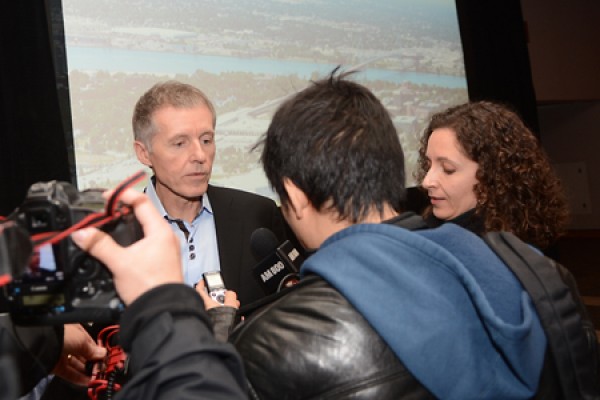 Reporters surround UWindsor president Alan Wildeman