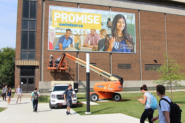 banner bearing an image of industrial engineering student Rita Thamarappallil 