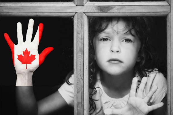 young girl peering through window