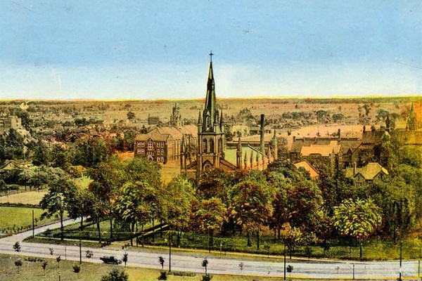 A picture postcard shows what Assumption Church and its neighbours looked like in 1924.