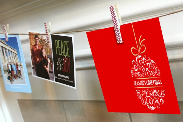 holiday cards strung over mantle