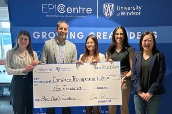 holding oversized cheque are ydney Thompson, Marc Mundy of sponsor Royal Bank of Canada, founders Michelle Dao and Joy-Lynn Kobti, EPICentre director Wen Teoh.