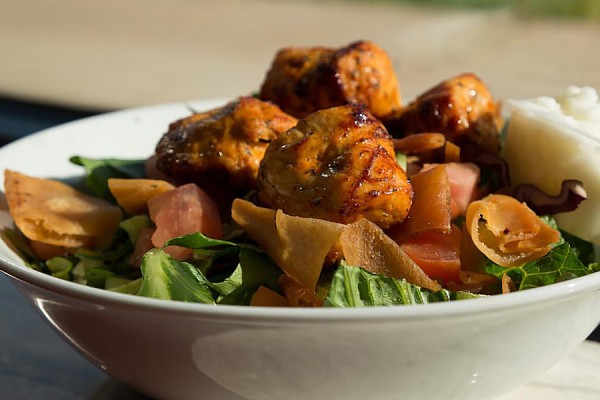 fattoush salad topped with shish tawook
