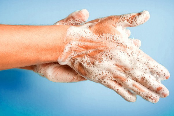 hands washing with soap suds