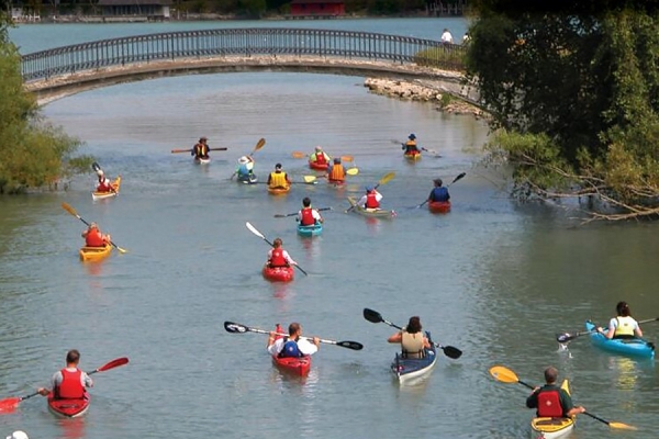 image opf canoeists and kayakers from cover of “Great Lakes Champions”