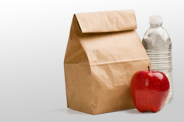 brown bag lunch with apple and water bottle
