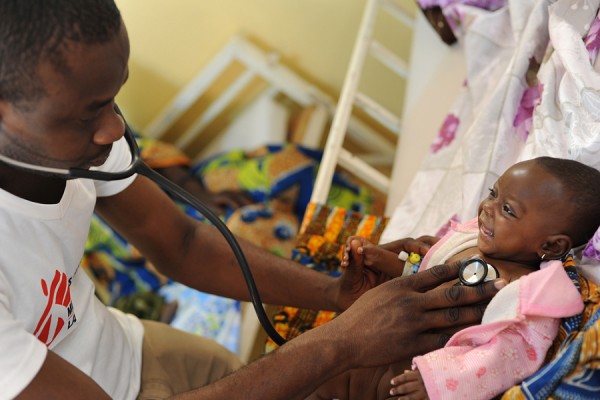 doctor helping patient