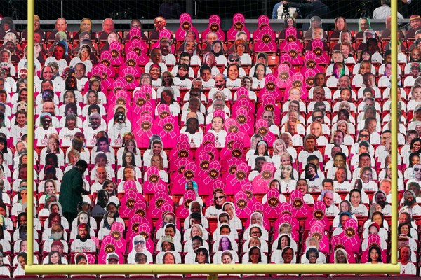 A Breast Cancer Awareness sign is seen before an NFL football game on Oct. 4, 2020.