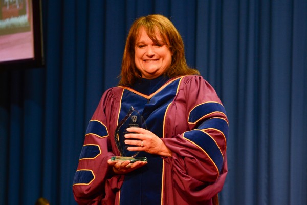 Professor Jill Grant earned an Alumni Award for Distinguished Contributions to University Teaching during the University’s 103rd Convocation ceremonies.