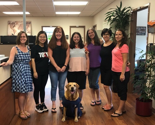 Sanford the Dog with Faculty of Education Staff