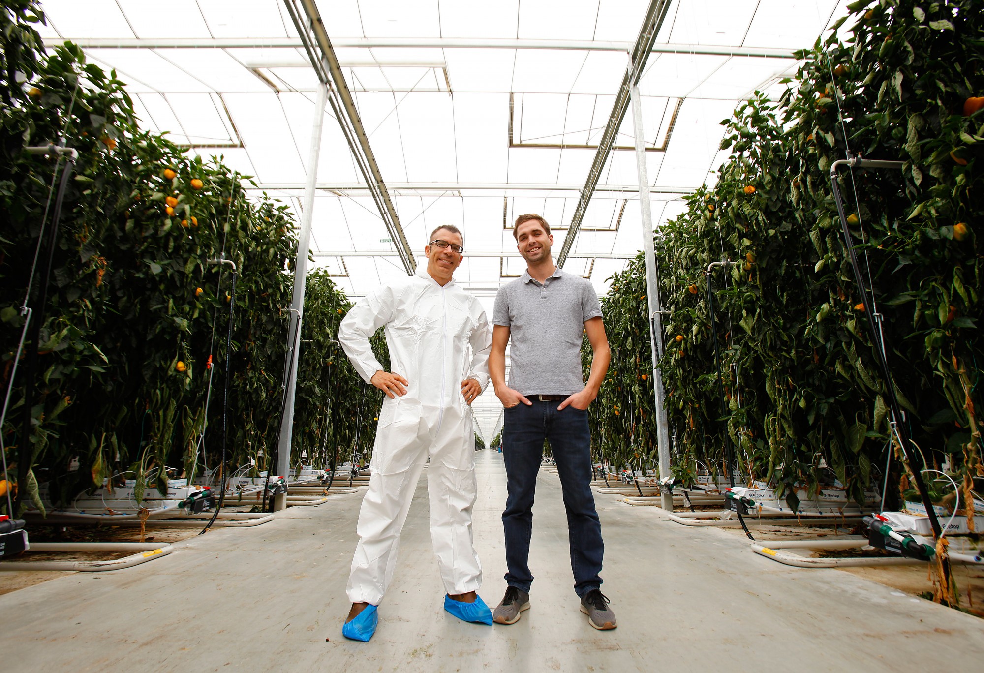 Dr. Rupp Carriveau (L) and Lucas Semple (R) are pictured at an Under Sun Acres greenhouse 2.