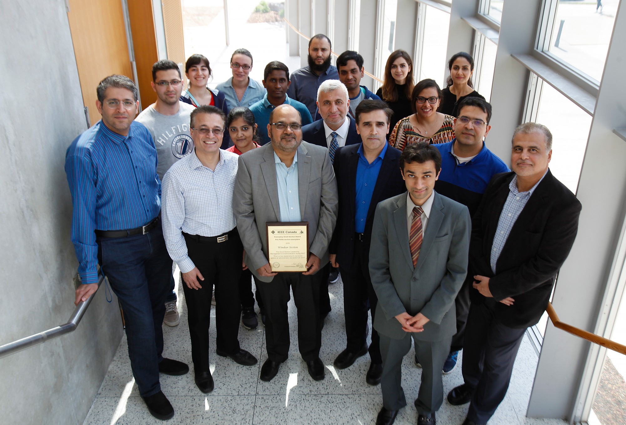 Dr. Mohammed Khalid, pictured centre with members of the IEEE Windsor Section.