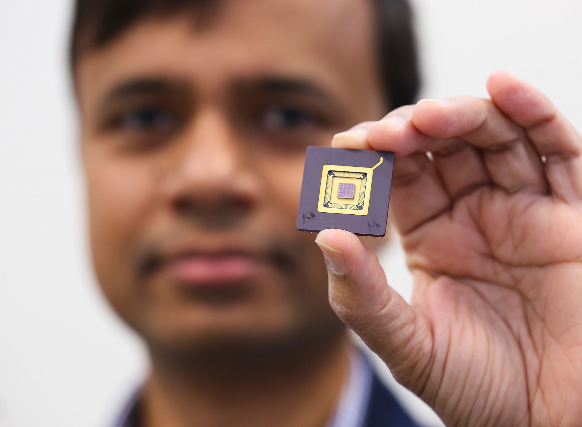 Dr. Jalal Ahamed holds a sensor