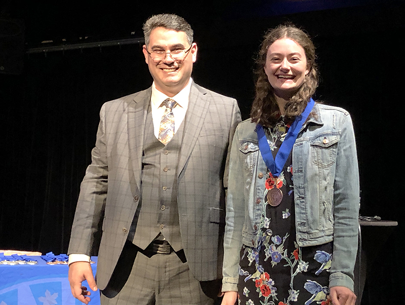 Dean Marcello Guarini congratulates LEAD Scholars Medallion recipient