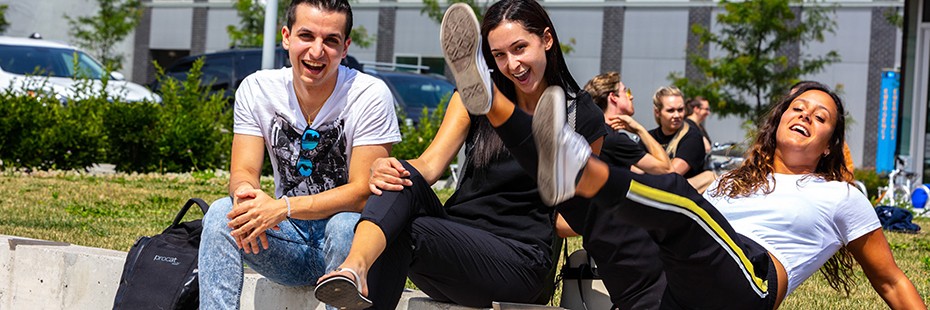 Students enjoy a sunny day outside Windsor Hall