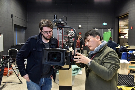 Prof. Min Bae works with 4th year student in SoCA&#039;s film studio