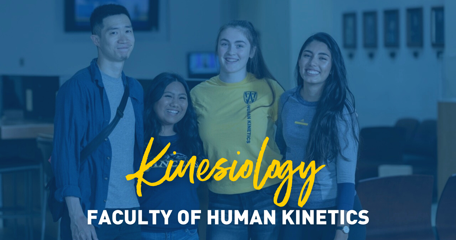 four Kinesiology students smiling