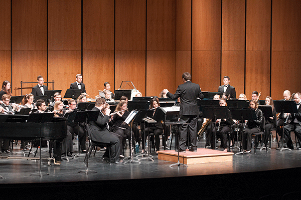 Dr. Papador conducts the University Wind Ensemble at the Capitol Theatre