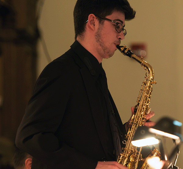 Saxophonist Sebastian Bachmeier performing with the Jazz Ensemble