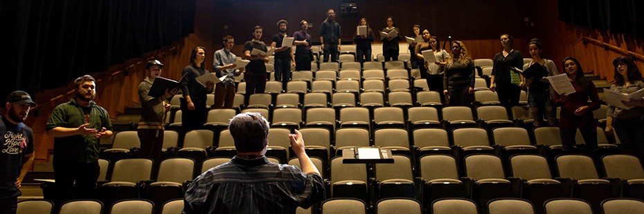 Dr. Bruce Kotowich rehearses UWindsor Chamber Choir in the new Performance Hall