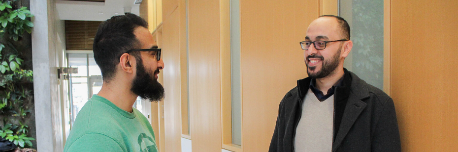 Imam Yousef Wahb speaking with a student