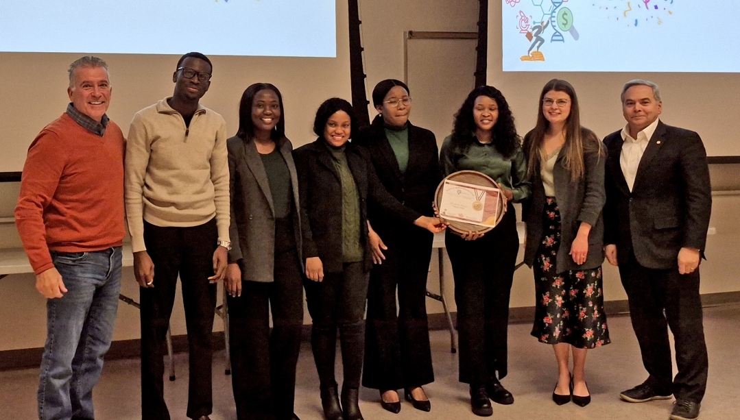 Pitch to Win participants and judges standing together for a photo.