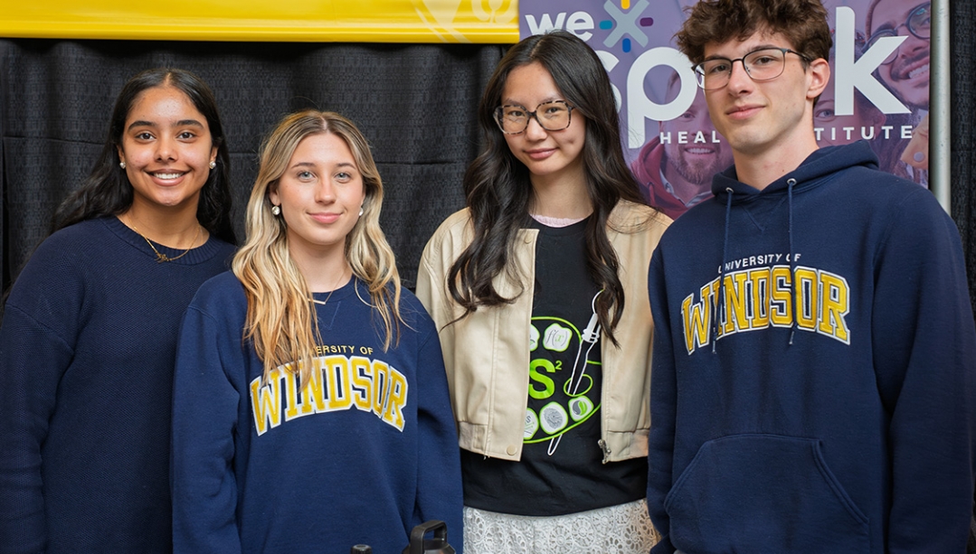 Students at Open House booth.
