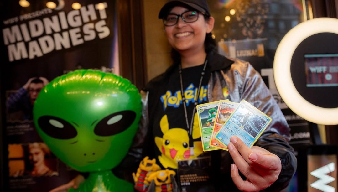 Fatima Rivzi engages with visitors at the entrance of Capitol Theatre Student volunteer helps out at WIFF 2026