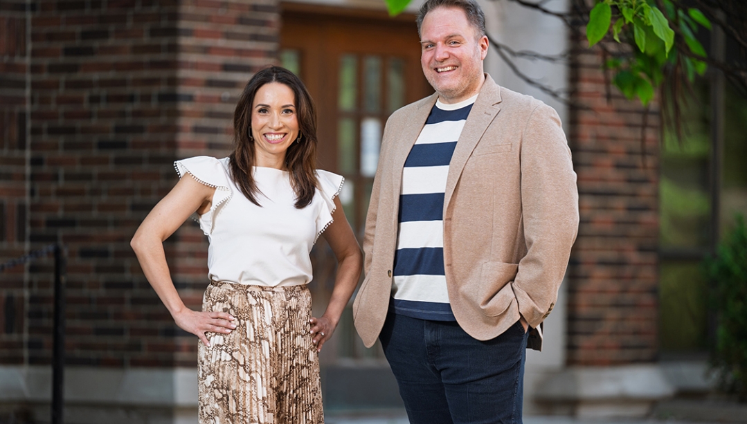photo of Dr. Emmanuelle Richez and Dr. Vincent Georgie standing in front of Memorial Hall
