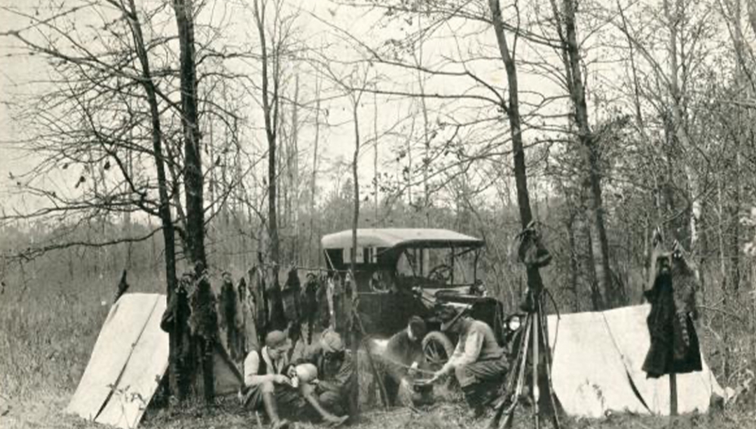 A raccoon hunting party gathers west of Windsor, likely in Yawkey Bush, circa 1925. (Photo courtesy of the Tony Techjo Collection, Leddy Library, SWODA/UNIVERSITY OF WINDSOR)