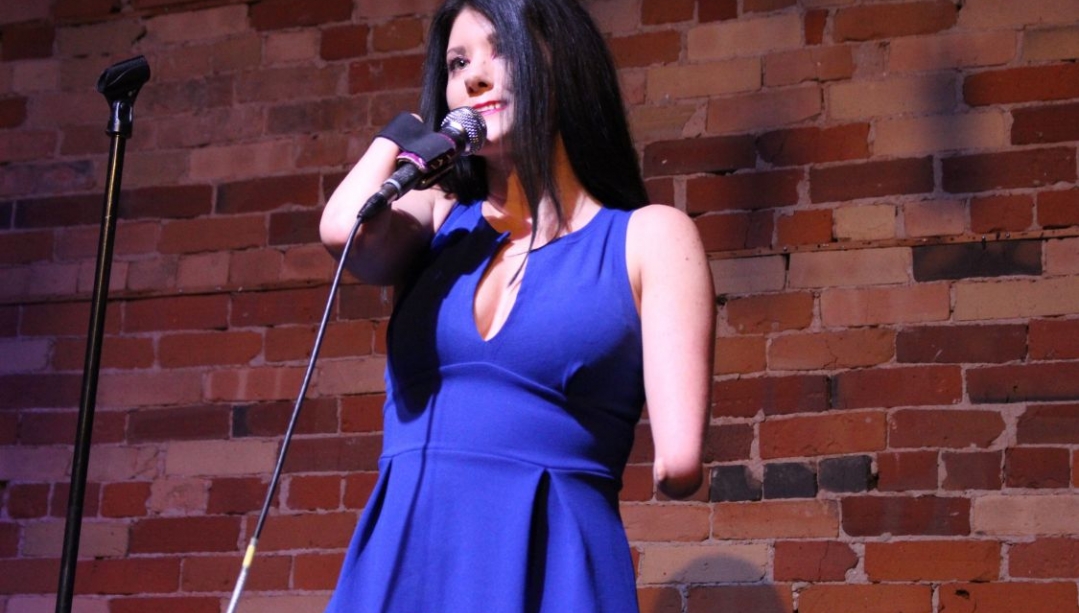 Courtney Gilmour performs stand up comedy