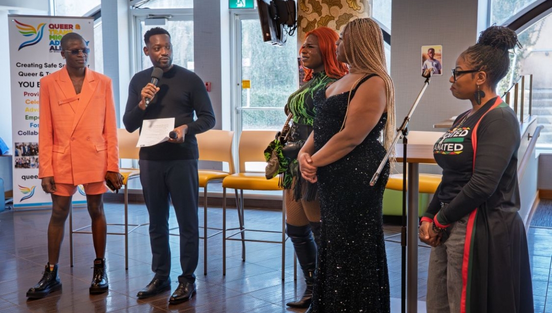Anold Mulaisho, Dr. Carlo Handy Charles, drag performers Valentina Rosé and Baddie Brooks, and Dr. Camisha Sibblis