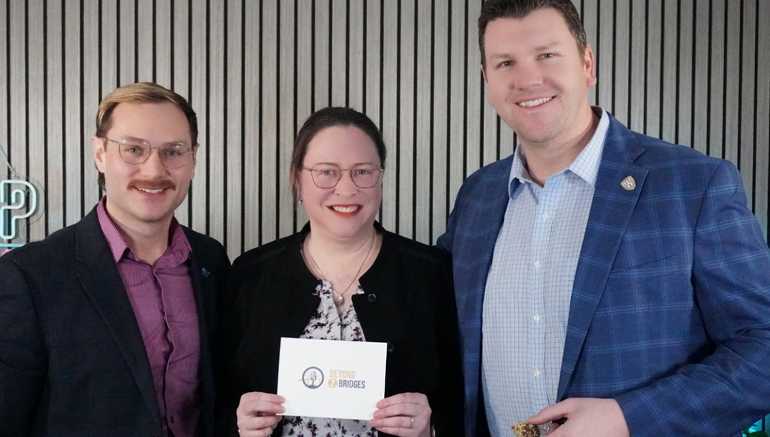 Dr. Josianne Marsan stands between Matthew Dumouchel and Ryan Donally